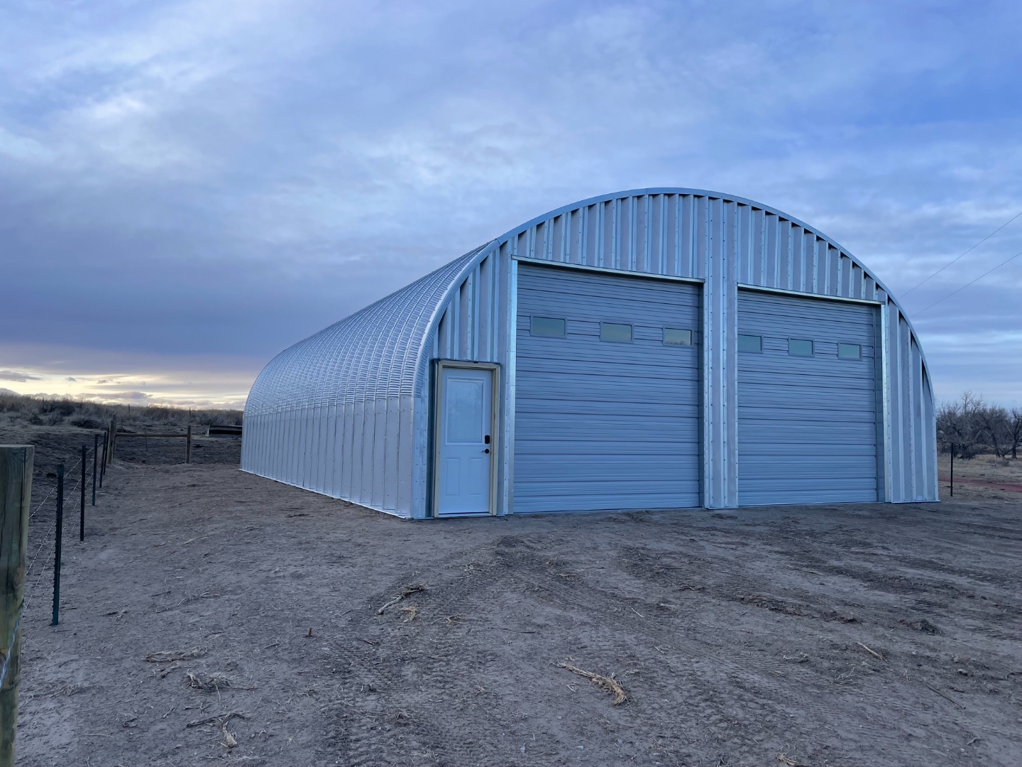 S Series dual-bay steel building at dusk